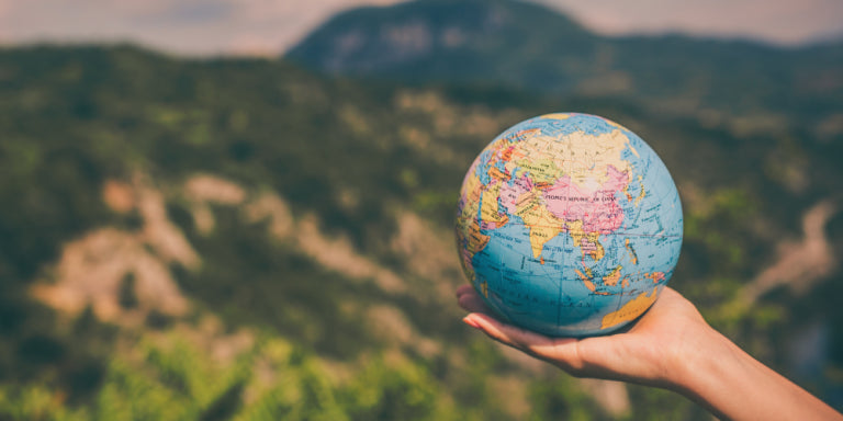 globe-in-hand.webp__PID:2ee91b8d-31a3-4235-8373-9b00ac17346e